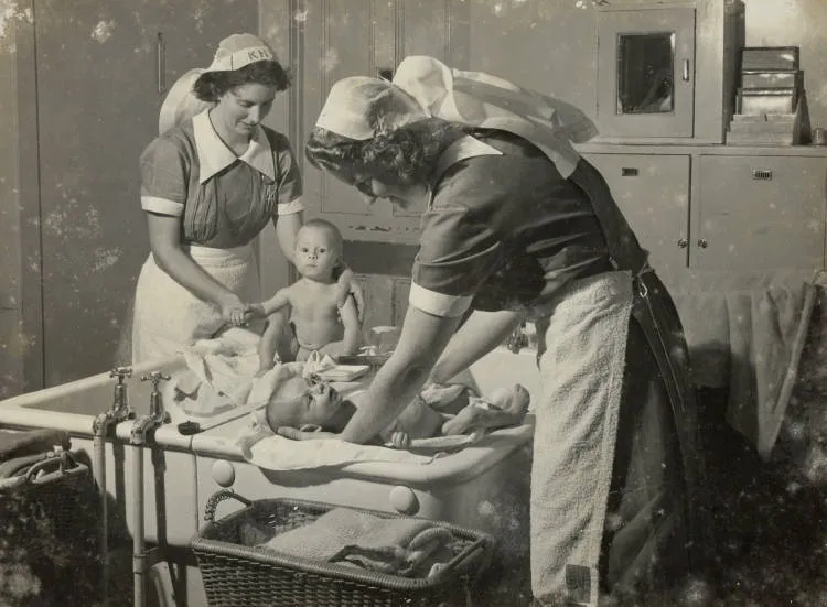 Bathing babies, Auckland, 1947