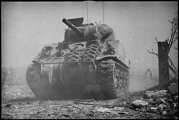 Image: New Zealand tank advances on Cassino the day it fell to 8th Army, Italy, World War II - Photograph taken by George Kaye