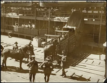 Image: Creator unknown : Photograph showing troop horses being loaded onto transportation during World War I