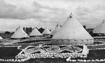 Stonework decorations in front of tents at a Featherston military camp