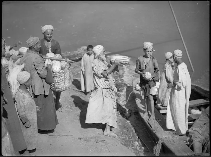 Bargeload of melons being unloaded and sold near the 'Mad Mile', Cairo - Photograph taken by George Kaye