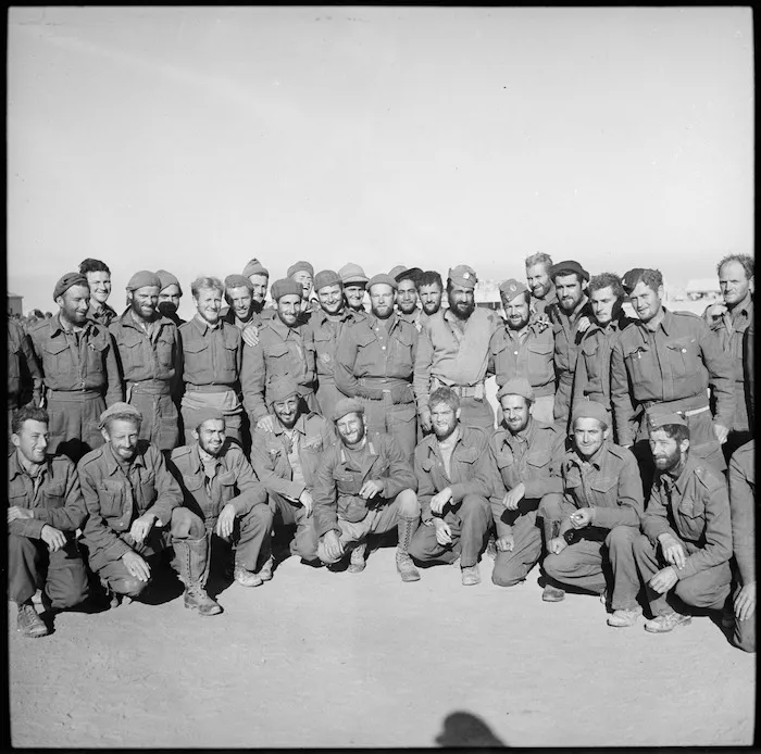 New Zealanders back at NZ Base Camp after imprisonment in Bardia, Libya - Photograph taken by M D Elias