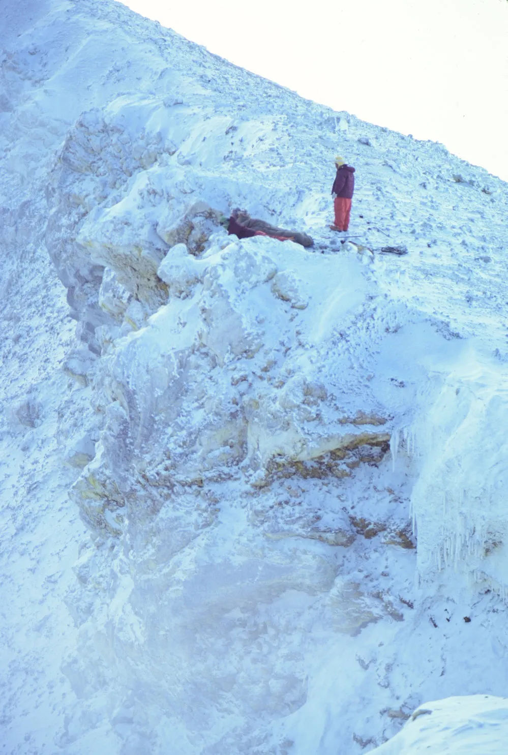 Ray Dibble Japanese Scientists peering into main crater from rim