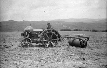 Image: Fordson tractor pulling a roller : photograph