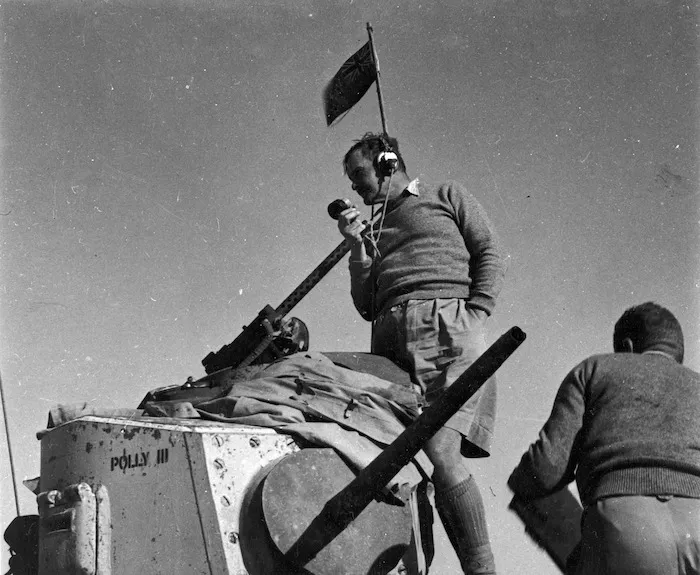Paton, H fl 1942 (Photographer) : Commanding officer General Freyberg directing a World War 2 operation in Egypt from the turret of his Honey tank