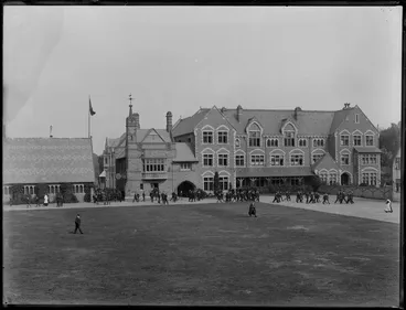 Image: Quadrangle and buildings at Christ's College, Christchurch, including School House and Big School, with students and masters walking through grounds
