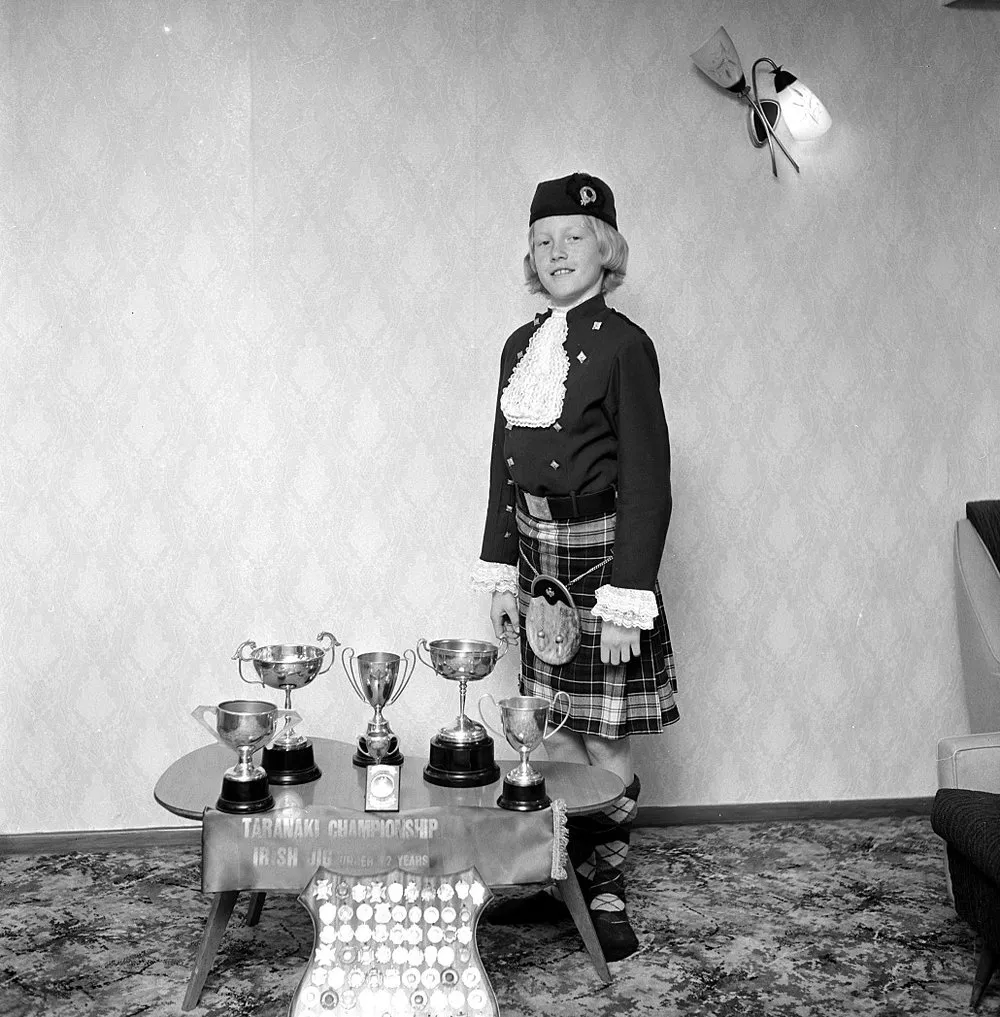 Tracey Watson with Highland dancing trophies. [P1-1165-3555]
