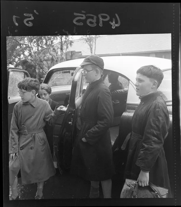 Partially blind children getting out of car, Te Aro School, Wellington